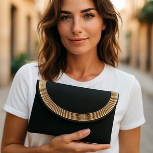 Black and Gold Crescent Clutch with Metallic Trim